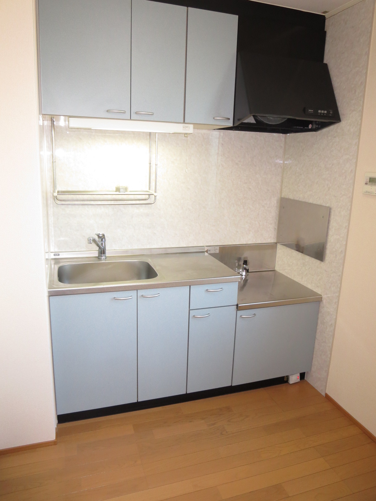 Kitchen. Housed plenty of bright kitchen. Pat ventilation because there is a window.