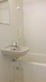 Bath. It is a bath with a bathroom dryer.