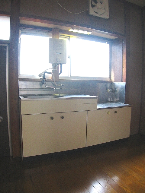 Kitchen. It has a window in the kitchen.