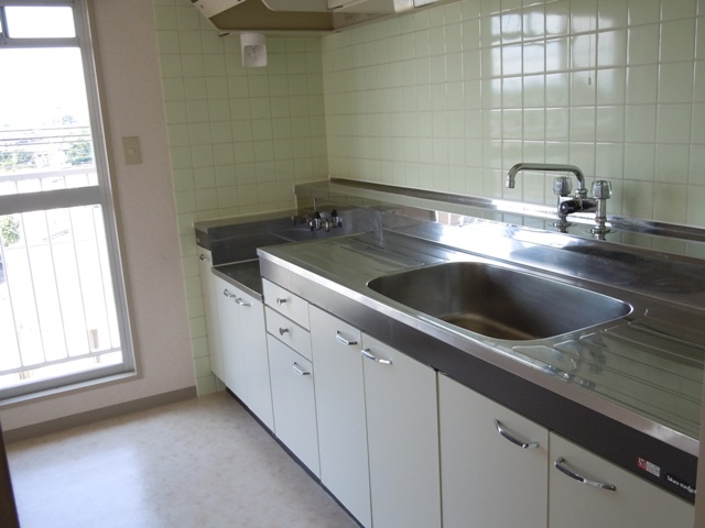 Kitchen. It goes out directly to the east balcony from the kitchen