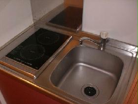 Kitchen. Cooked in a two-burner stove is smooth.