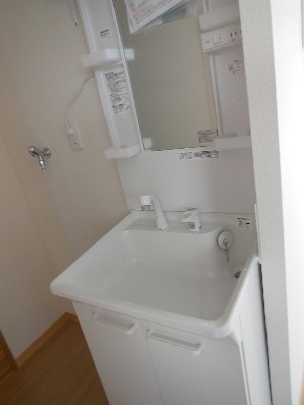 Washroom. Shampoo is Dresser new