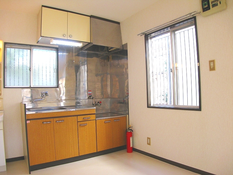 Kitchen. It has a small window in the kitchen.