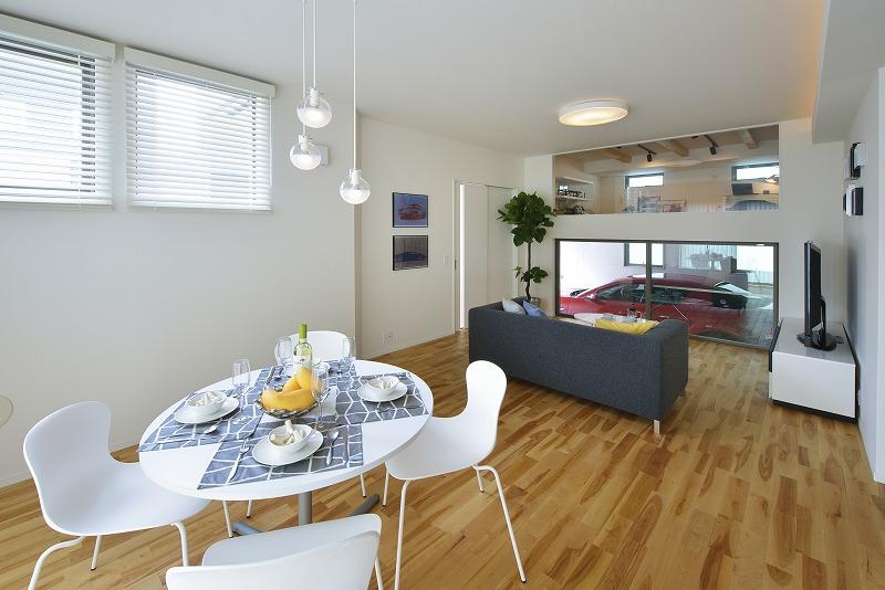 Living. Luxury look at the car from the living room "of the built-in garage house."