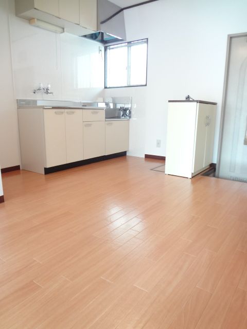 Kitchen. With a window of the dining is bright.