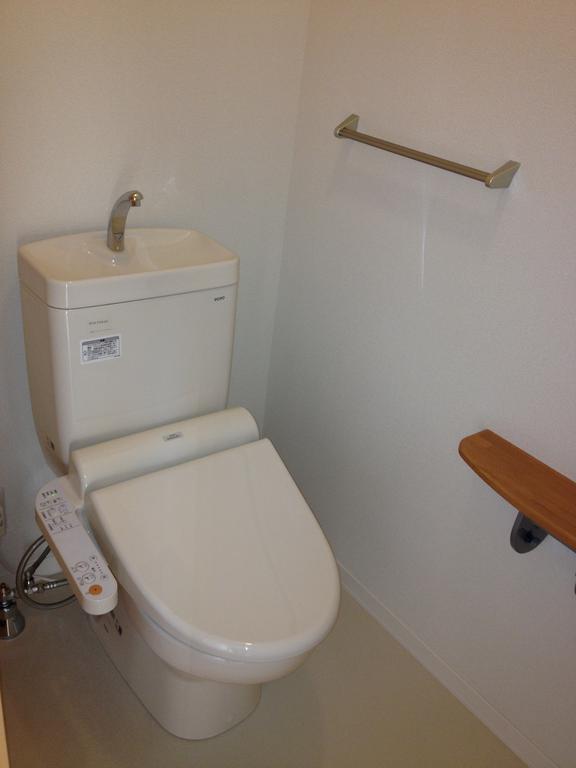 Toilet. Warm water washing toilet seat