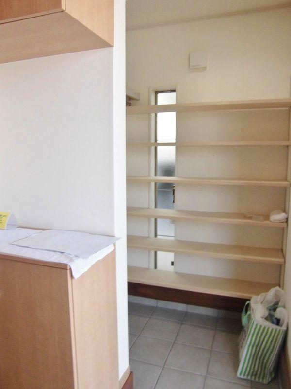 Entrance. There is a dirt floor housed in the entrance