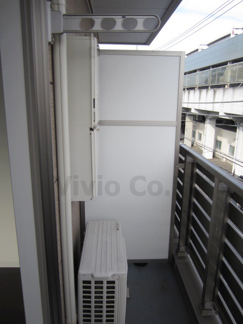 Balcony. The weather is nice, Laundry is Jose. 