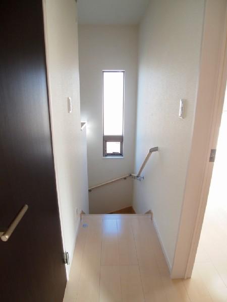 Other introspection. Also bathed in bright sunshine on stairs.