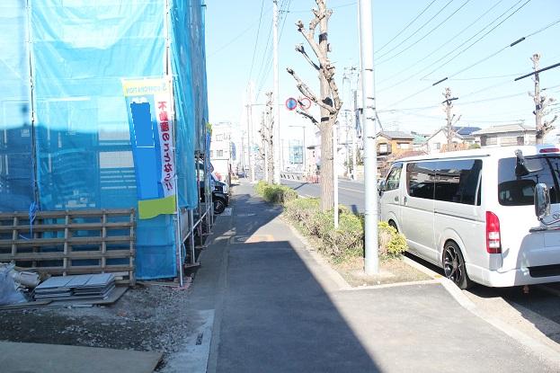 Local photos, including front road. Front road with a sidewalk
