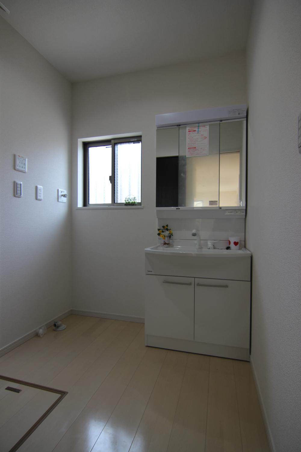 Wash basin, toilet. Building 2 washroom