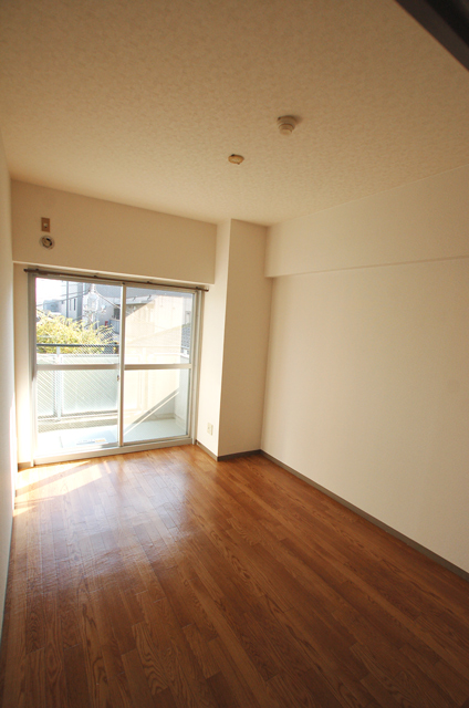 Other room space. Sunny space with plenty bathed in light from the balcony