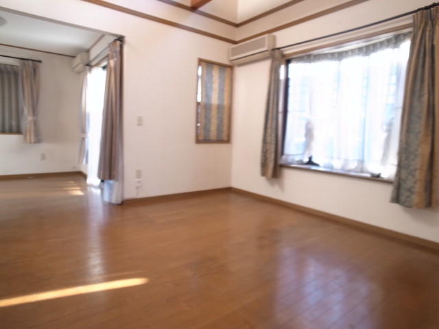 Living and room. There is also a large living-dining kitchen. 