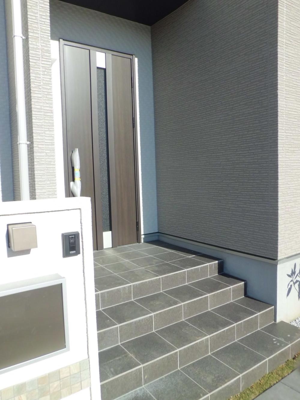 Entrance.  [Model house entrance door] Key card with the front door (September 2013) Shooting