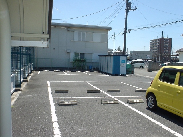 Parking lot. Parking is one minute free. 