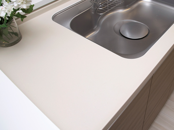 Kitchen.  [Artificial marble work top] The top plate of the kitchen, Weatherability, Impact resistance, Adopting the excellent artificial marble in design.