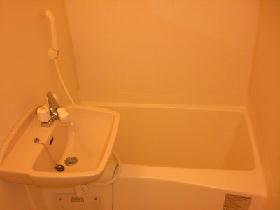 Bath. It is a bath with a bathroom dryer. 