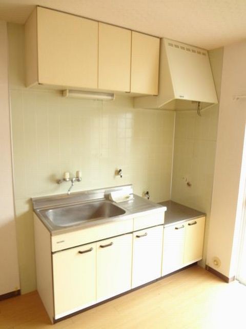 Kitchen. It is a sink spread of kitchen