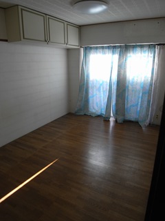 Other room space. With the upper cupboard where the room is not narrow