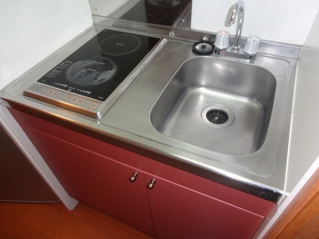 Kitchen. Glass top two-burner stove with