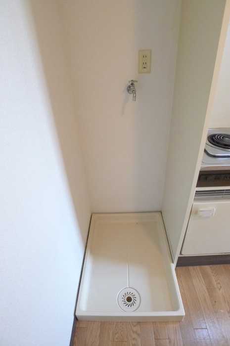 Other Equipment. Washing machine in the room