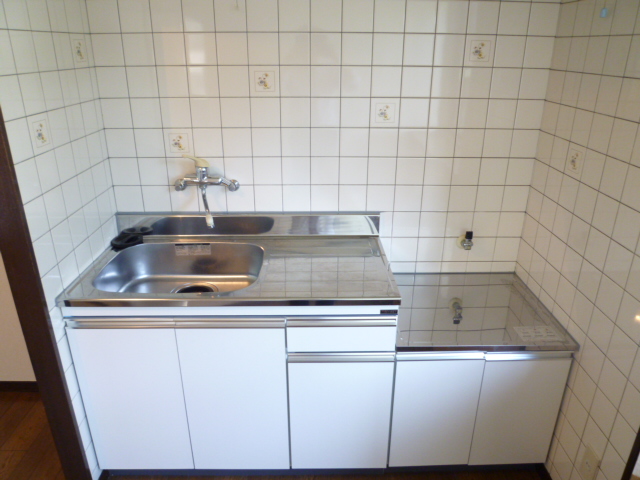 Kitchen. It is a photograph of another room in the same building.