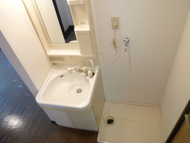 Washroom. It is a photograph of another room