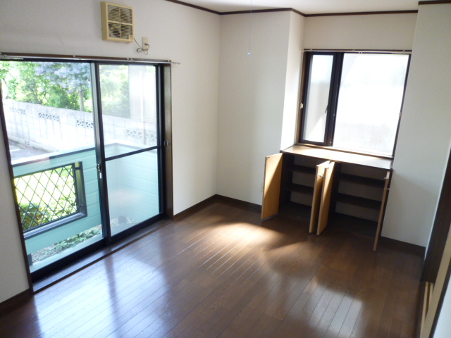 Living and room. It is a photograph of another room in the same building.