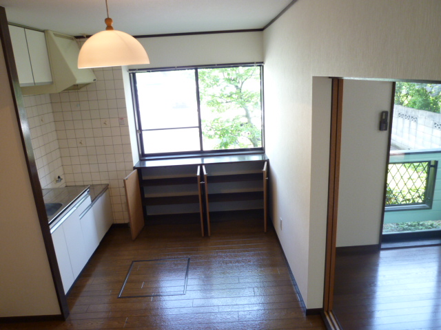Living and room. It is a photograph of another room in the same building.