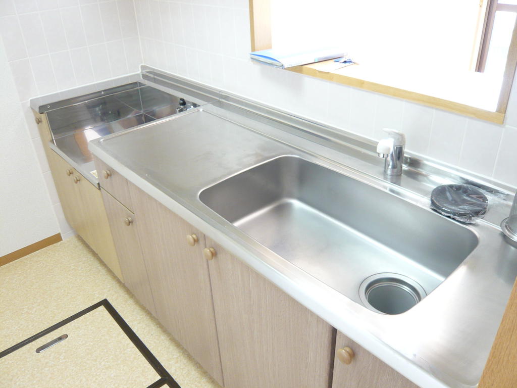 Kitchen. It is a photograph of another room.