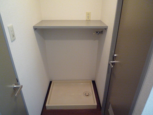 Other Equipment. Washing machine in the room