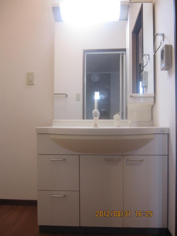 Washroom. Washbasins with a large mirror