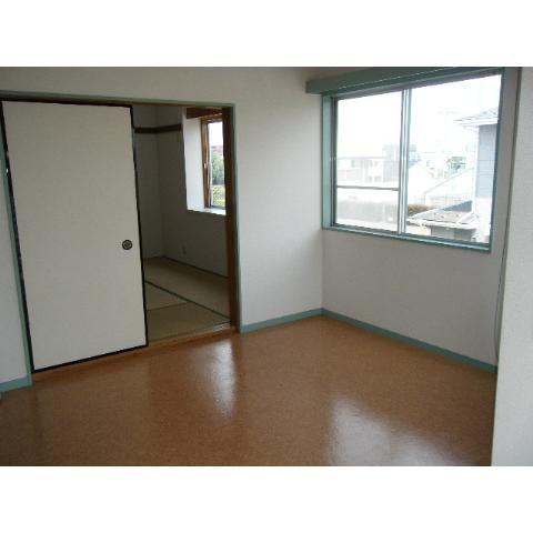 Toilet. It is another room photo of the same building. 