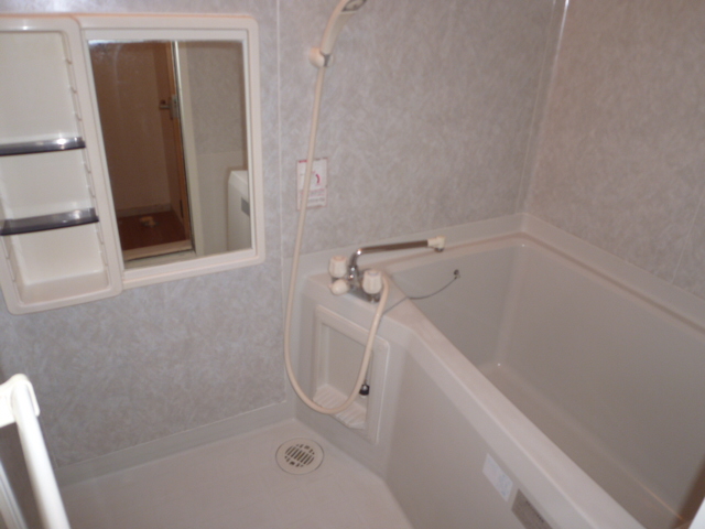 Bath. It is a photograph of another room