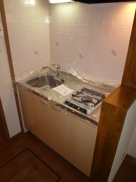 Kitchen. It is a photograph of another room