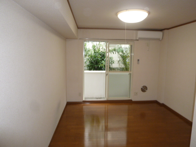 Living and room. It is a photograph of another room