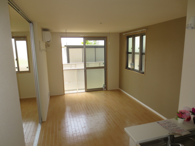 Living and room. It will be another room of the same type.