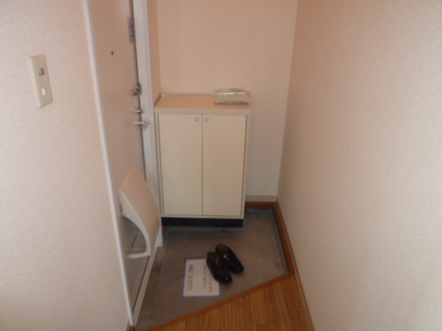 Entrance. It is a photograph of another room of the same properties