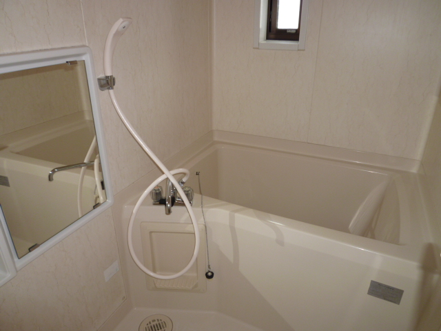 Bath. It is a photograph of another room of the same properties