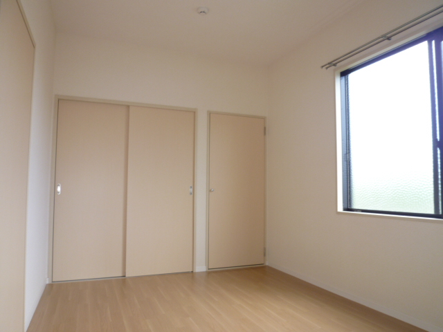 Other room space. It is a photograph of another room of the same properties