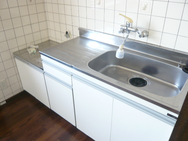 Kitchen. It is a photograph of another room in the same building. 