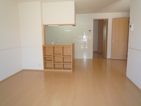 Living and room. It is a photograph from a different angle