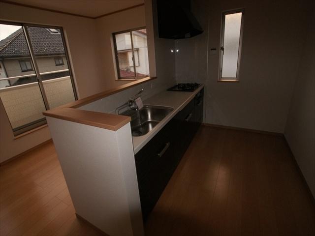 Kitchen. Face-to-face kitchen overlooking the living room