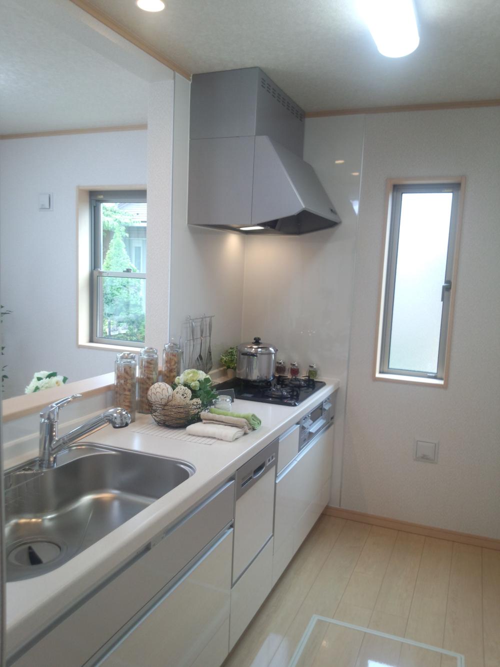 Kitchen. The standard equipment hanging cupboard the dishwasher has to produce a sense of openness and placed in the top rear