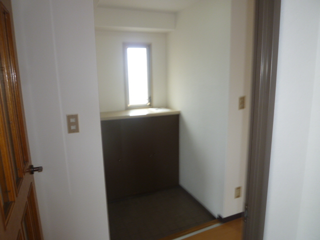 Entrance. It is a photograph of another room