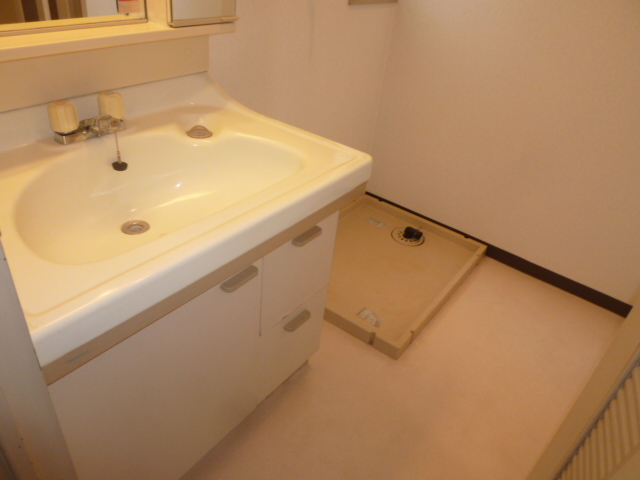 Washroom. It is a photograph of another room