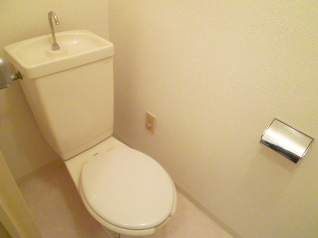 Toilet. The same is by Property of the room.
