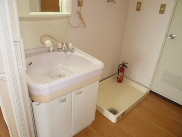 Washroom. It is a photograph of another room