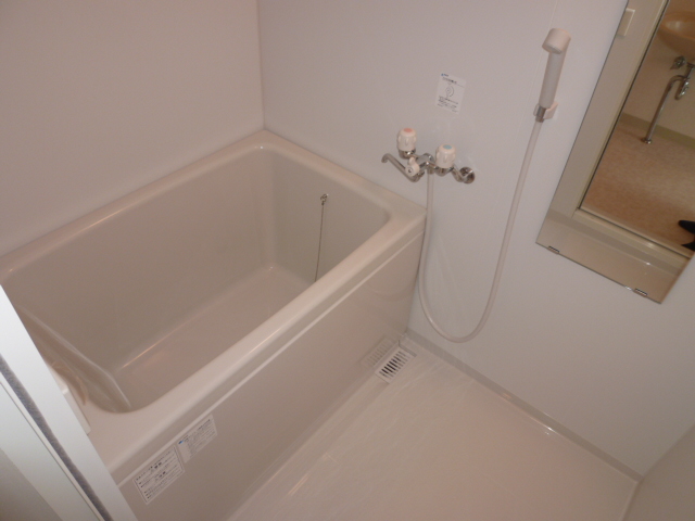 Bath. It is a photograph of another room