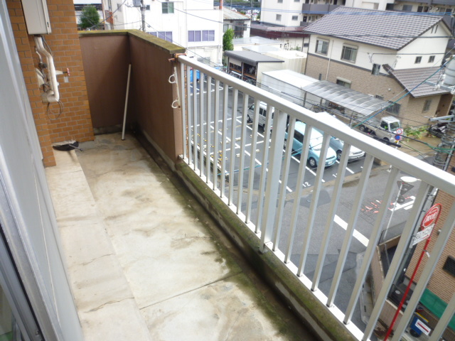 Balcony. It is a photograph of another room